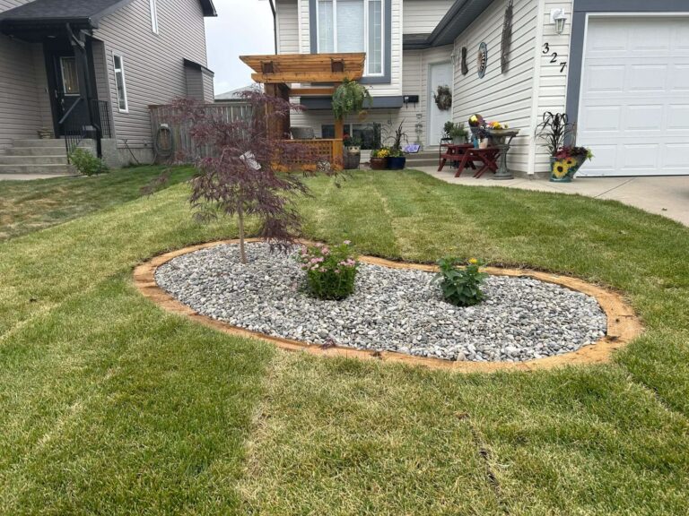 Front yard rock bed landscaping in Lethbridge